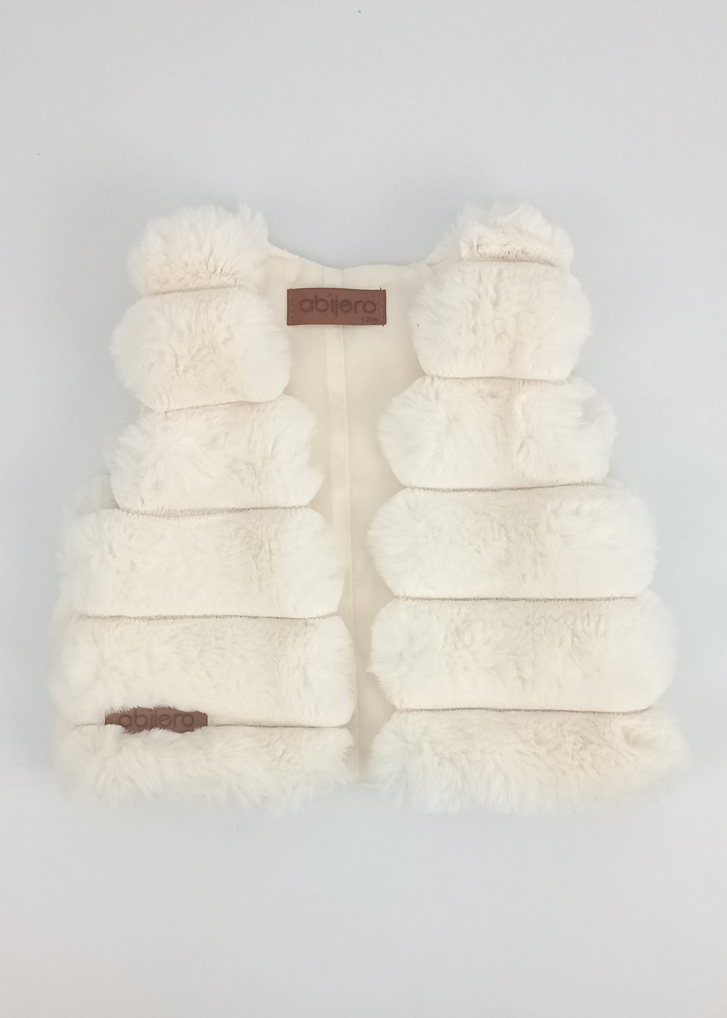 Regalo Listo! Conjunto Chaleco marfil y busito ada bebita