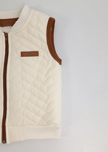 Chaleco impermeable con ovejero niño