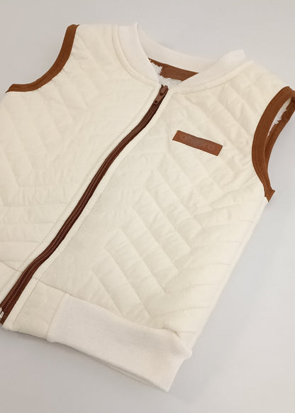 Chaleco impermeable con ovejero niño