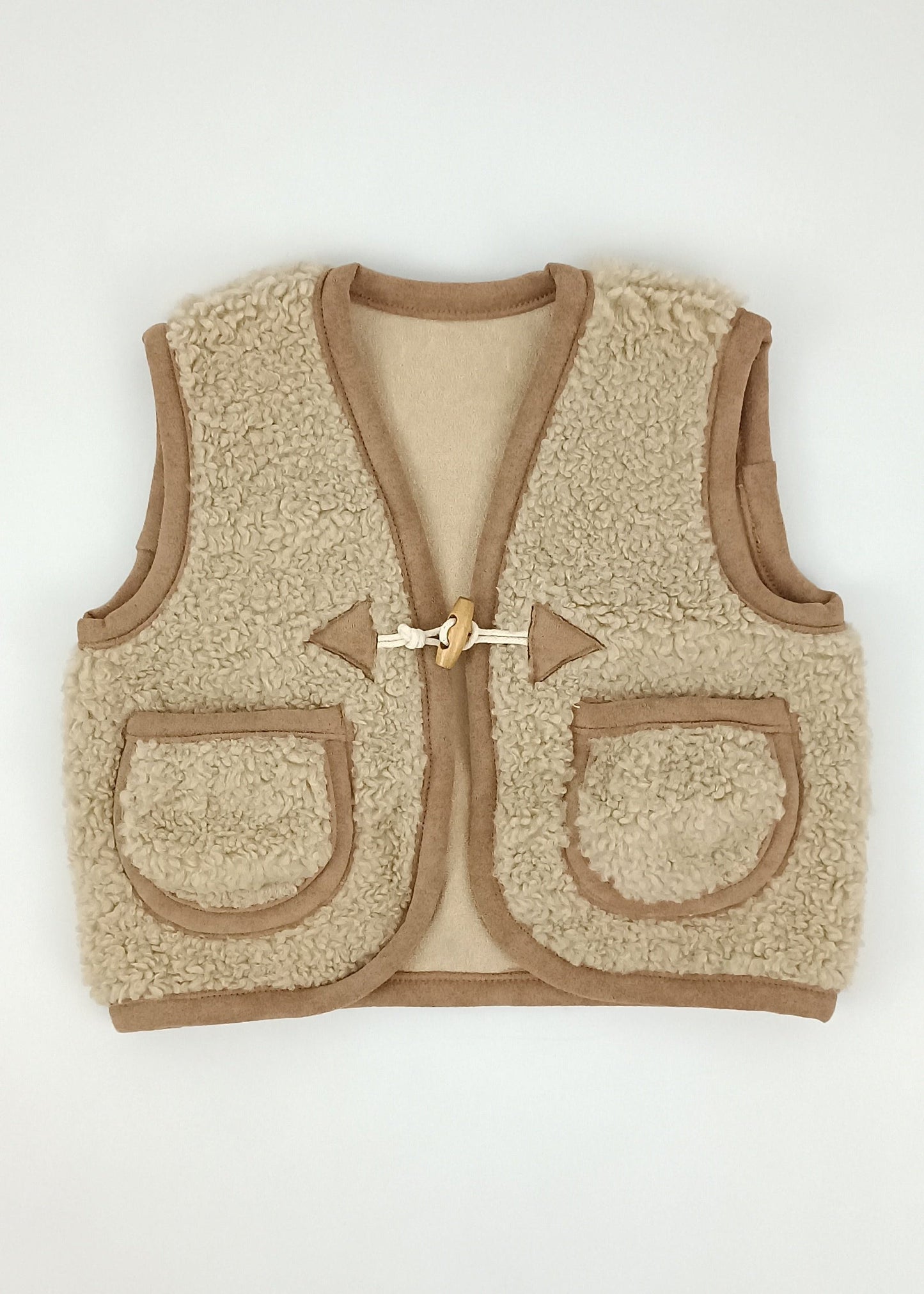 Chaleco Peluche con bolsillos bebito y niño unisex